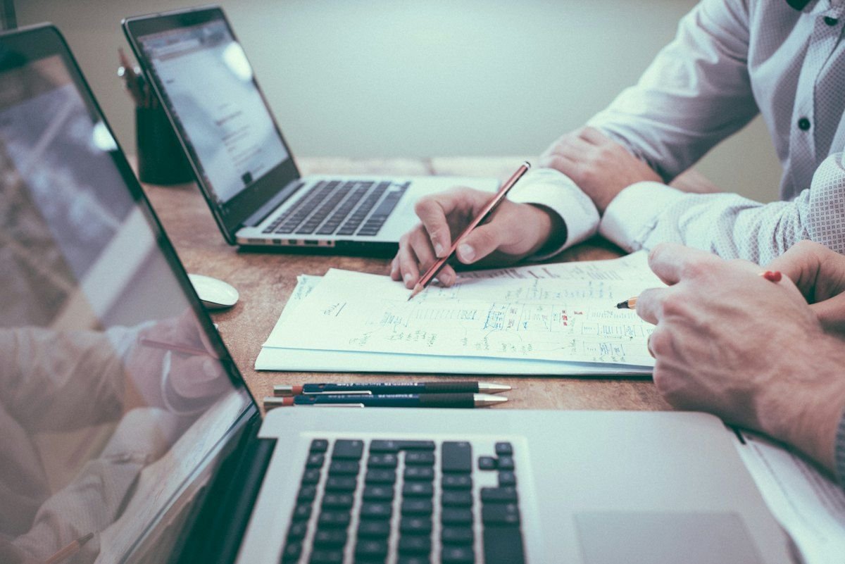 Consultant reviewing documents with a client