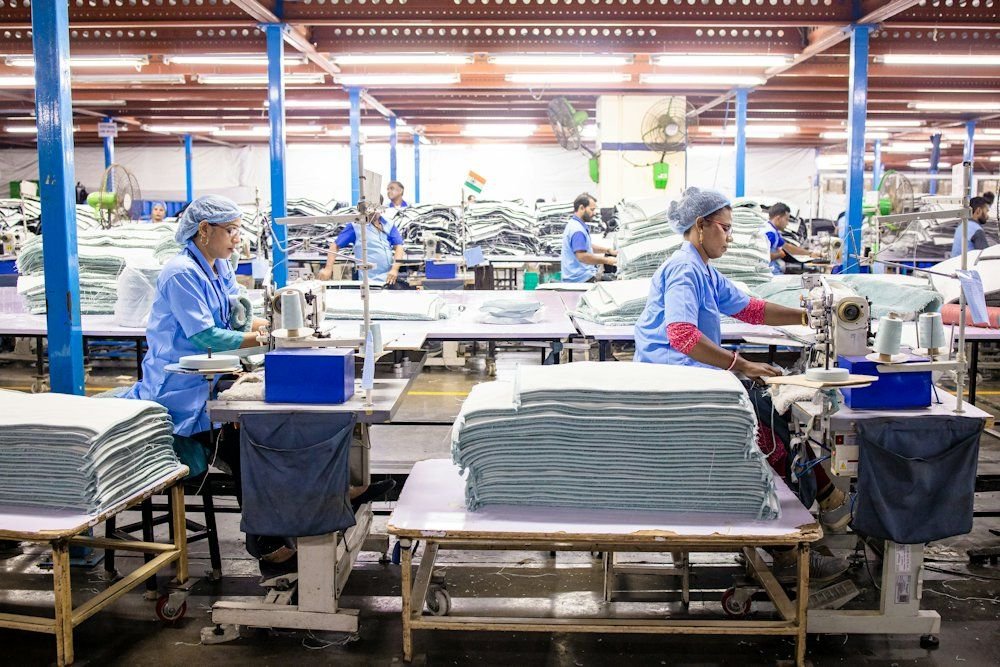 Inspector checking products on a factory line